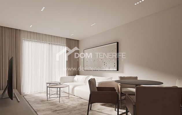 Olympic Residences 109: living room with TV wall – new build in Adeje, Tenerife