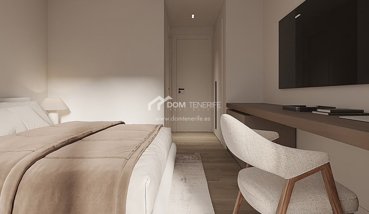 Olympic Residences 314: dormitorio con zona de escritorio – obra nueva en Adeje, Tenerife